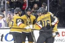 The Golden Knights come together to celebrate their second goal during the first period of the ...