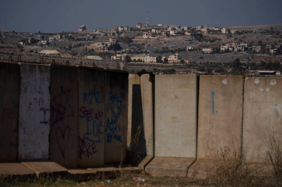 Damaged buildings stand on an area in southern Lebanon, during the ceasefire between Israel and ...