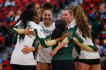 Colorado State teammates celebrate a point during the Mountain West Championship volleyball gam ...