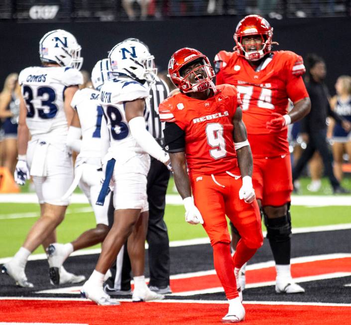 UNLV running back Jai'Den Thomas (9) celebrates after scoring a touchdown during the NCAA colle ...