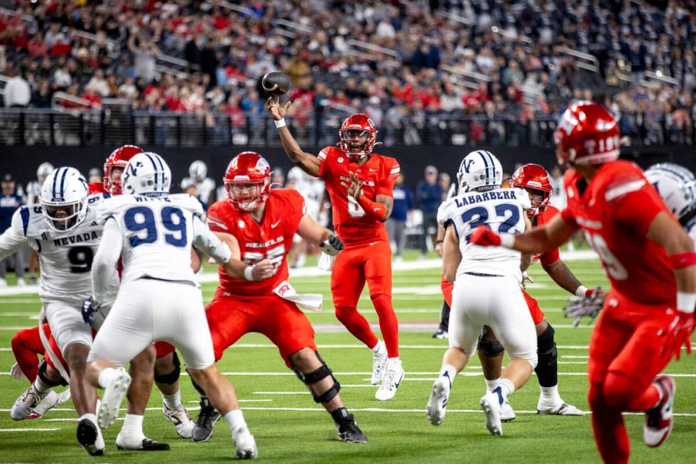 UNLV quarterback Hajj-Malik Williams (6) throws the ball during the NCAA college football game ...