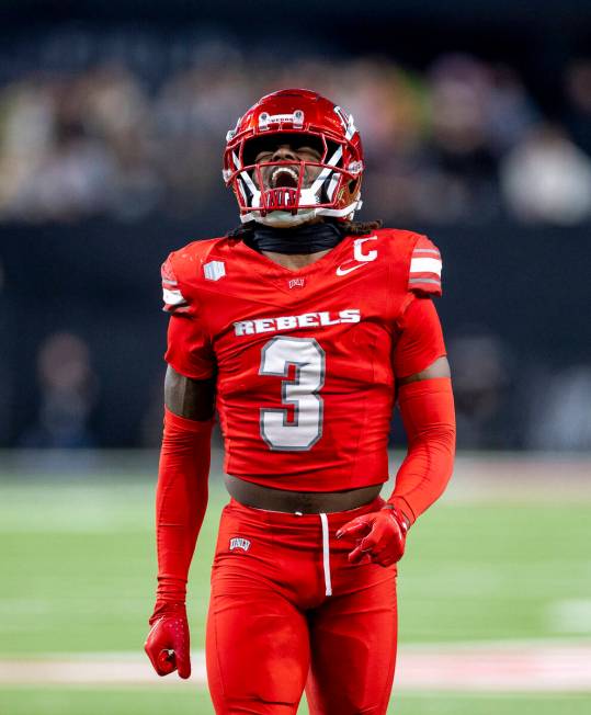 UNLV defensive back Johnathan Baldwin (3) winces while walking after a play during the NCAA col ...