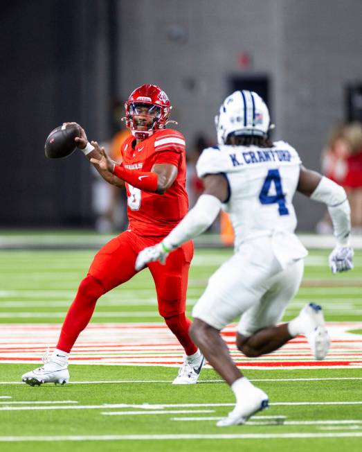 UNLV quarterback Hajj-Malik Williams (6) looks to throw the ball during the NCAA college footba ...