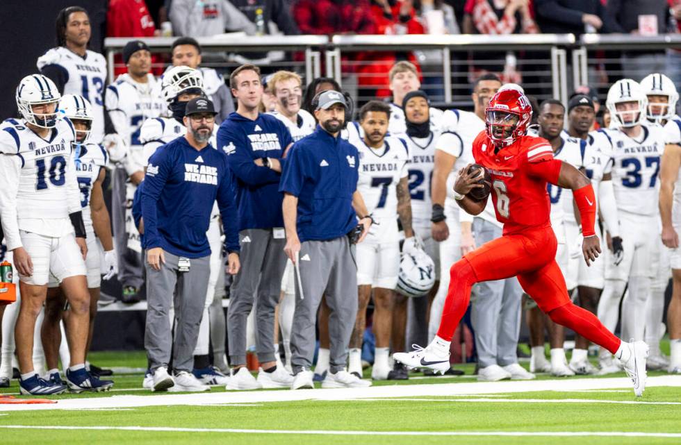 UNLV quarterback Hajj-Malik Williams (6) runs with the ball during the NCAA college football ga ...