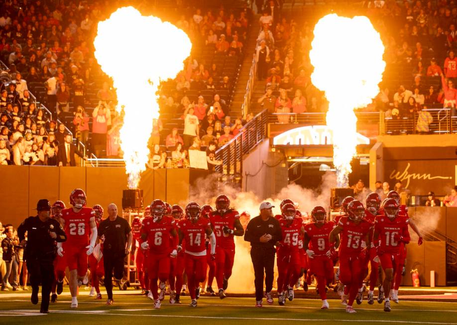 UNLV enters the field before the 50th ‘Battle for the Fremont Cannon’ NCAA colleg ...