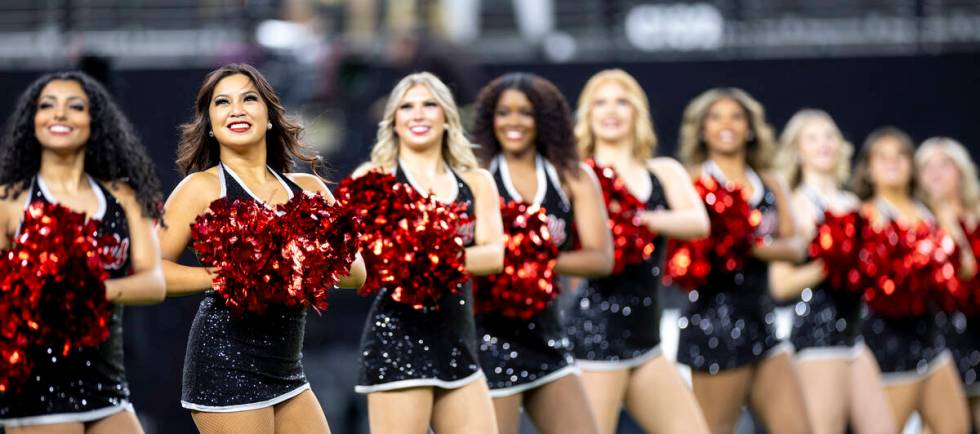 The UNLV Scarlet Dance Line performs before the NCAA college football game against UNR at Alleg ...