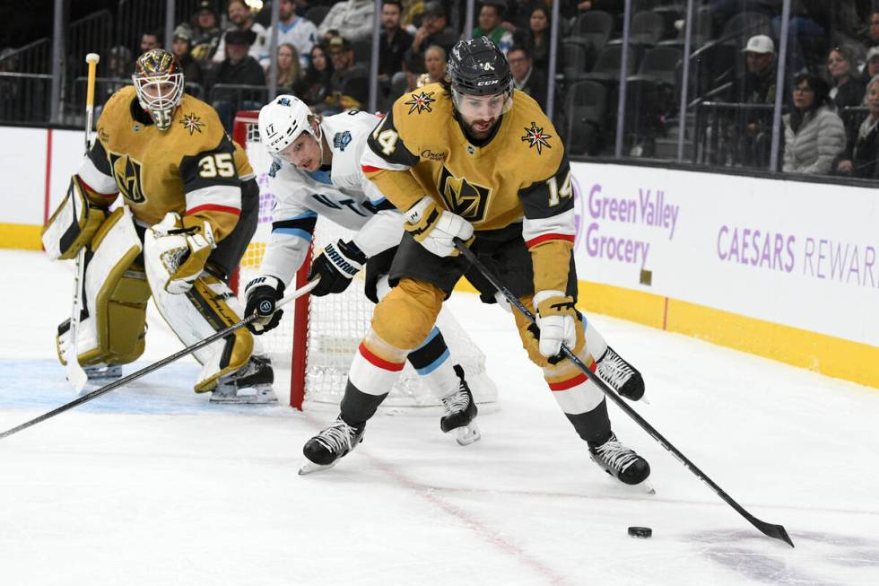 Utah Hockey Club center Nick Bjugstad (17) chases Vegas Golden Knights defenseman Nicolas Hague ...