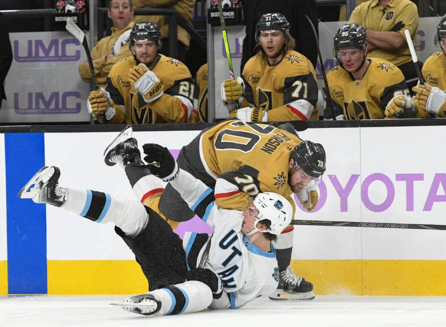 Vegas Golden Knights players react as Vegas Golden Knights left wing Tanner Pearson (70) knocks ...