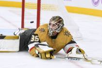 Vegas Golden Knights goaltender Ilya Samsonov (35) looks behind himself as a puck drops in the ...