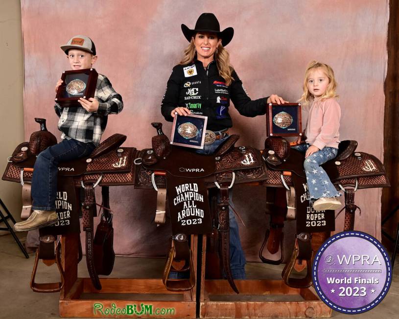 Jackie Crawford with her son Creed and daughter Journey in 2023 when she won three world titles ...