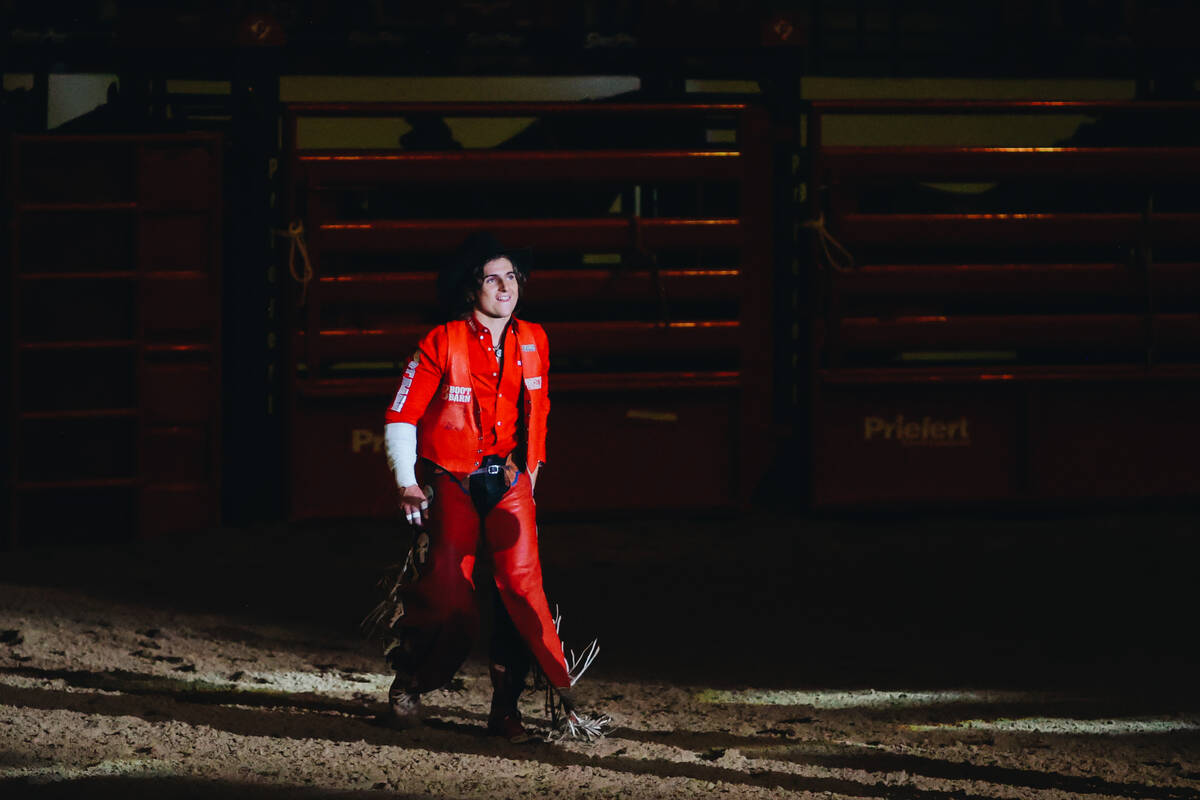 Popular rodeo cowboy Rocker Steiner walks onto the dirt during introductions for The Run For A ...