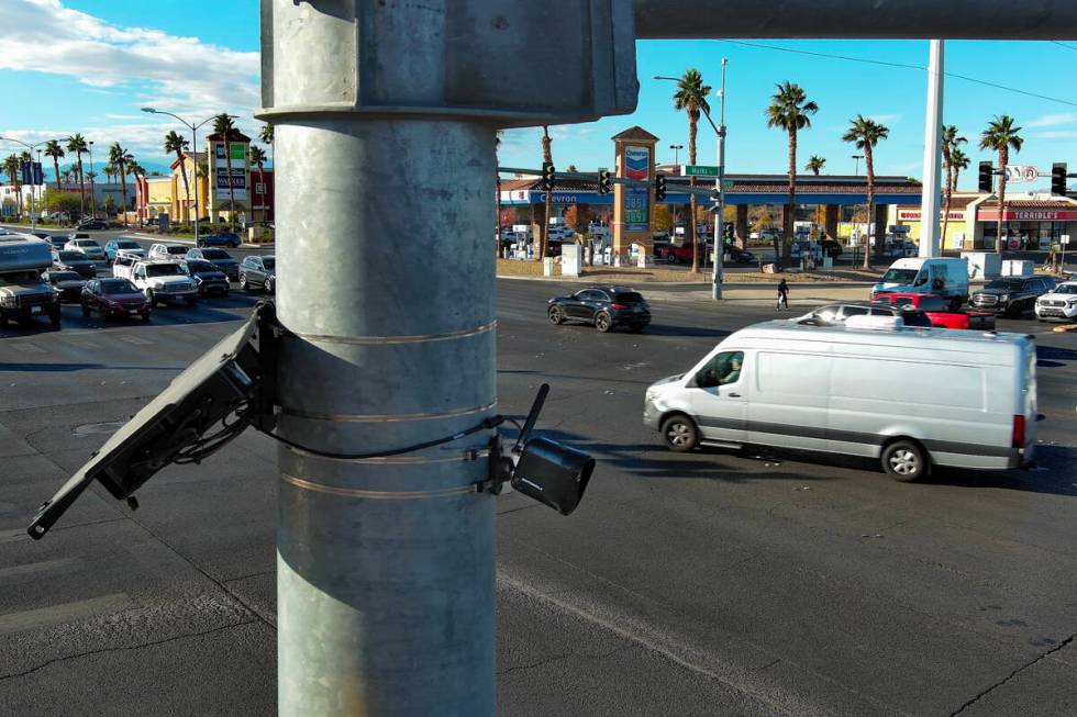 A license plate camera scans traffic at the intersection of Sunset Road and Marks Street in Hen ...