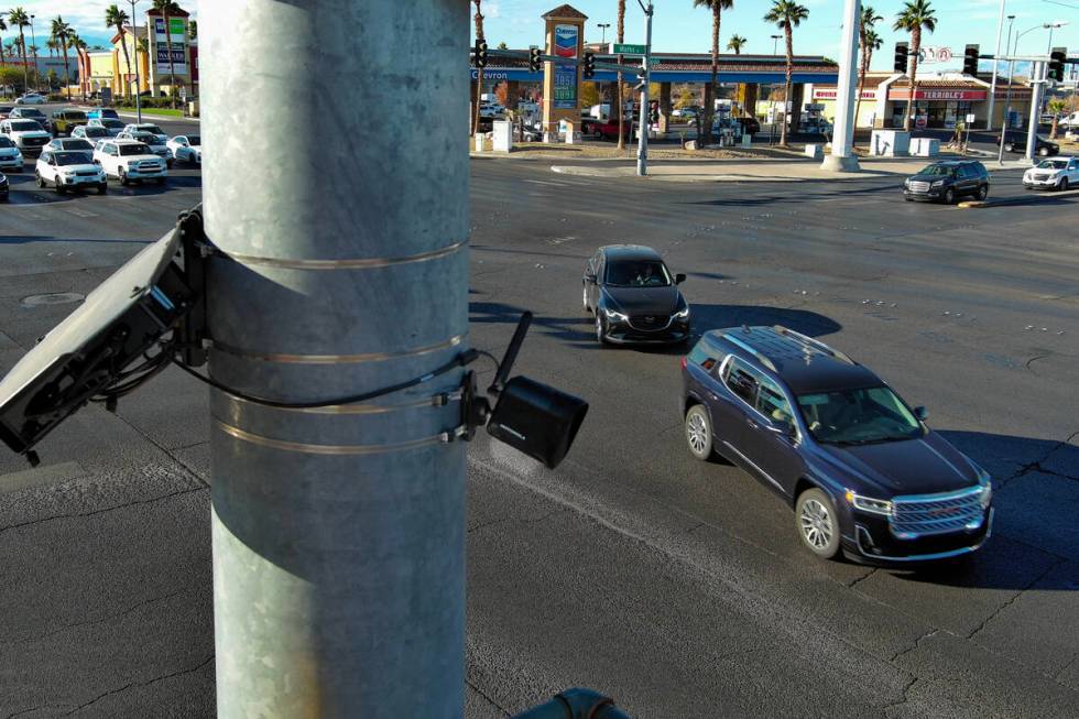 A license plate camera scans traffic at the intersection of Sunset Road and Marks Street in Hen ...