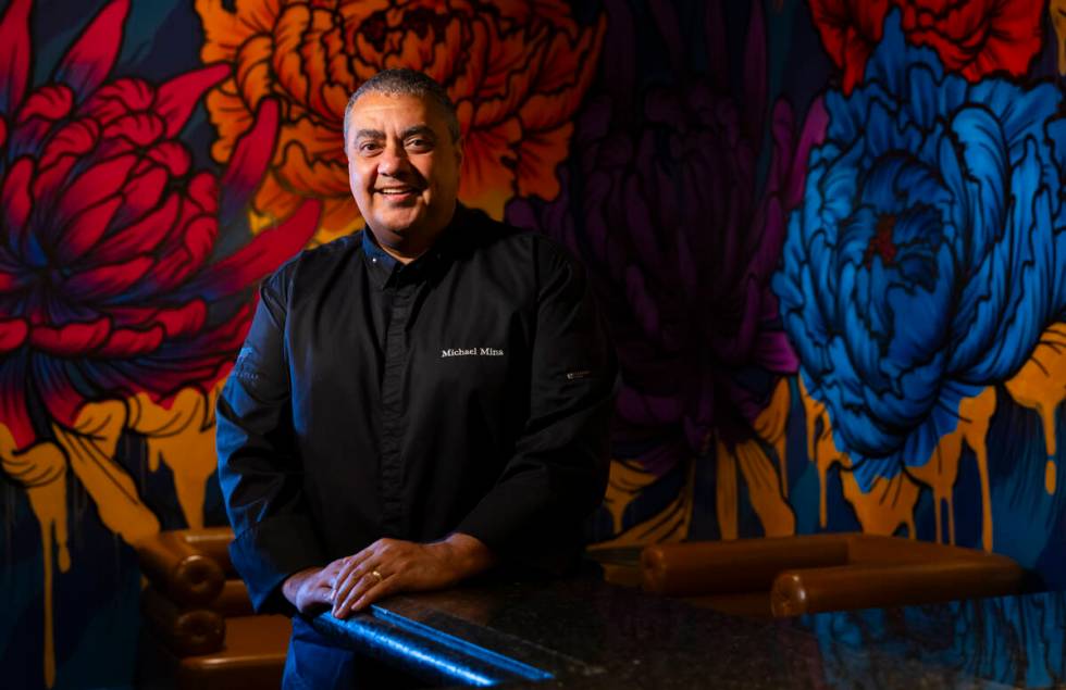 Chef Michael Mina poses for a portrait at his new restaurant, Bourbon Steak, at the Four Season ...