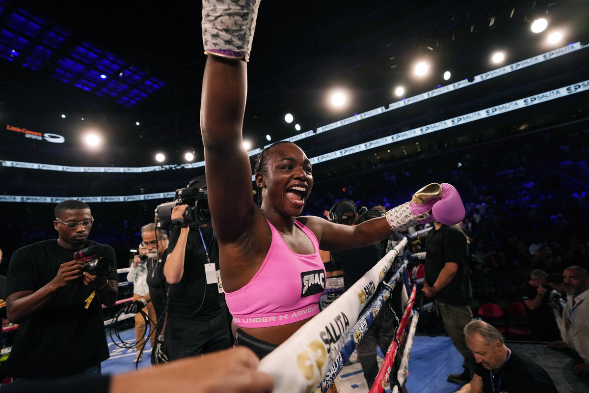 Middleweight champion Claressa Shields celebrates after defeating reigning WBC women's heavywei ...