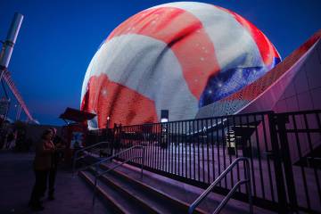 Pedestrians stand by the Sphere on Election Day on Nov. 5, 2024, in Las Vegas. (Madeline Carter ...