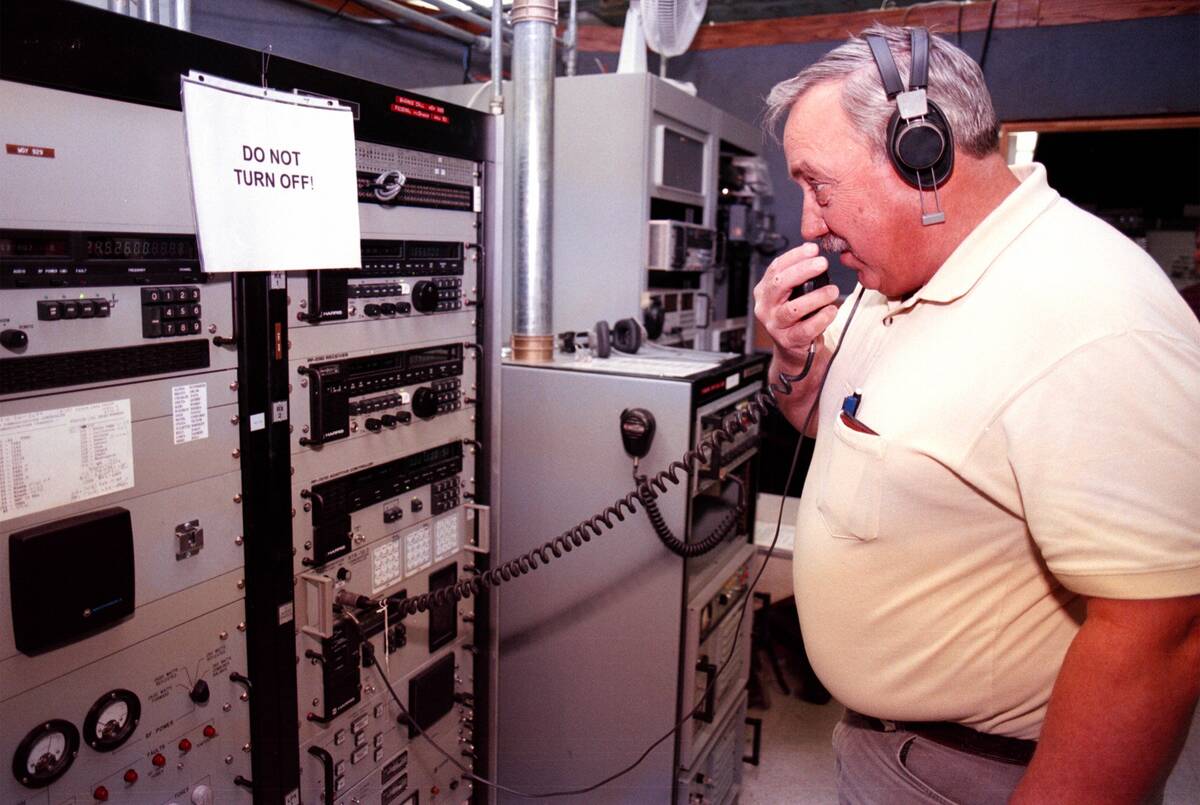 Nevada State Communications Officer Gary Derks tests a number of state and federal radio system ...