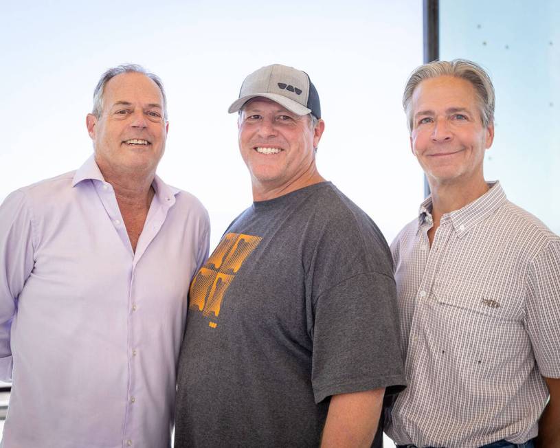 From left, David Daskal, owner of ESG Gallery; Jim Hurtado, Hang Ten's president; and homeowner ...