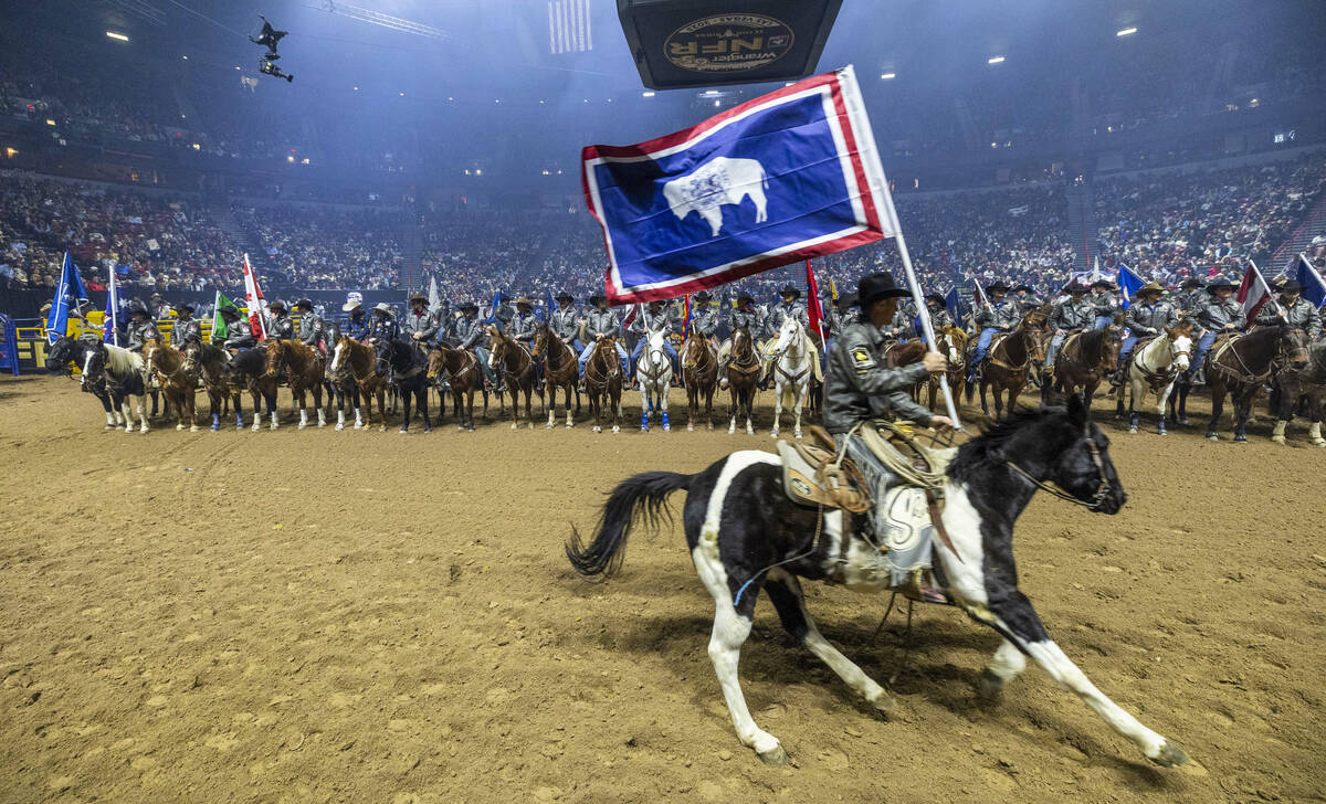 Contestants are introduced to the fans during day 6 action of the NFR at the Thomas & Mack ...