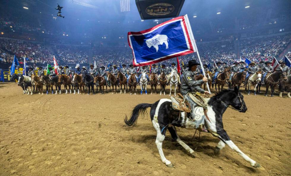 Contestants are introduced to the fans during day 6 action of the NFR at the Thomas & Mack ...