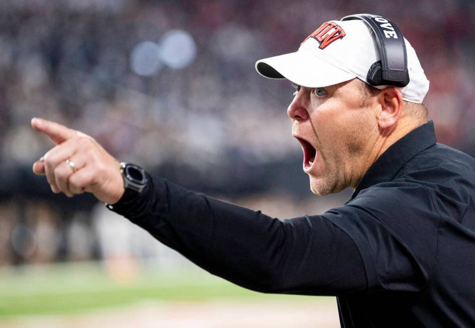 UNLV head coach Barry Odom yells at a referee during the NCAA college football game against UNR ...