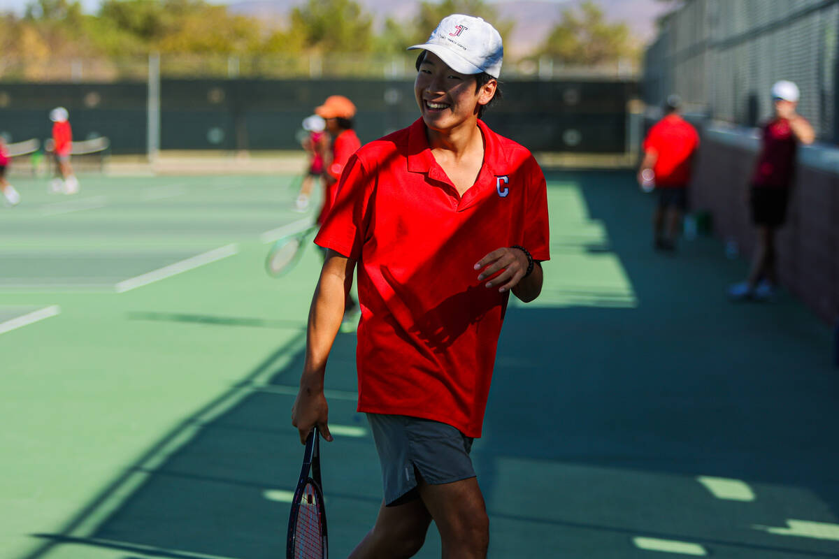 Coronado’s Grant Lee laughs during a 5A high school boys tennis state championships matc ...