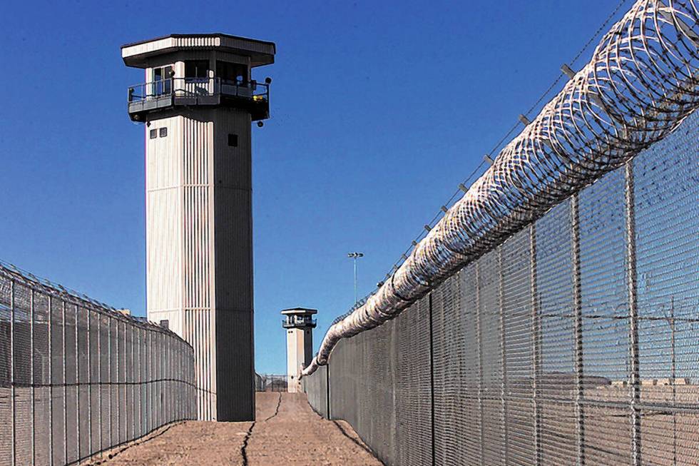 FILE - Guard towers at High Desert Prison near Indian Springs. (Las Vegas Review-Journal/File)