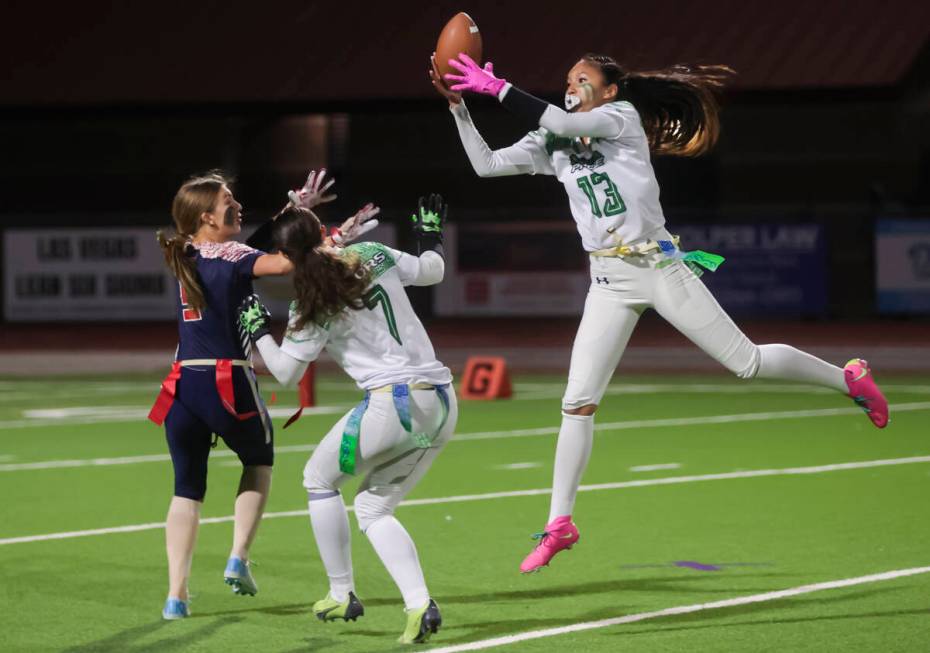 Green Valley's Gracie Rasavong (13) catches an interception during a flag football game at Coro ...