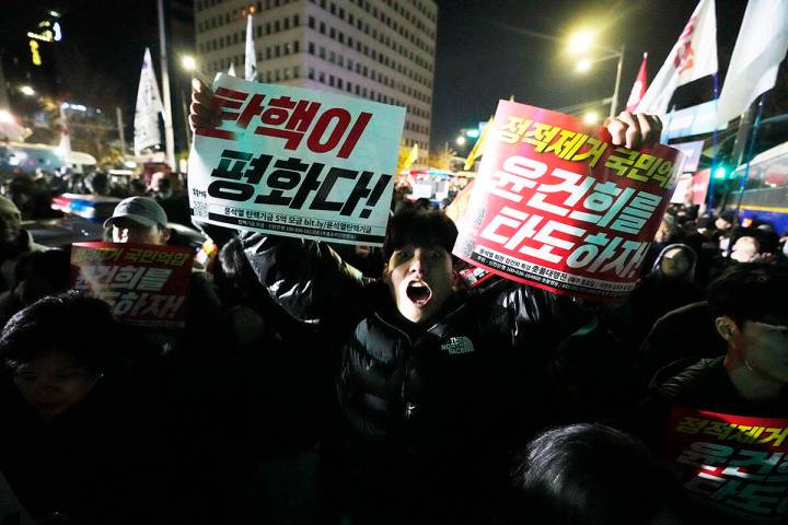 A man shouts to demand South Korean President Yoon Suk Yeol to step down in front of the Nation ...