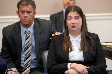 Tears fall down the cheeks of Jamie Lee Komoroski as family members of Samantha Miller speak ab ...