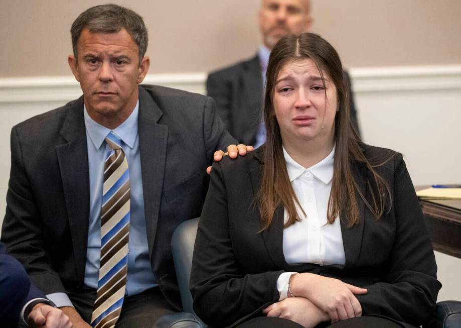 Tears fall down the cheeks of Jamie Lee Komoroski as family members of Samantha Miller speak ab ...