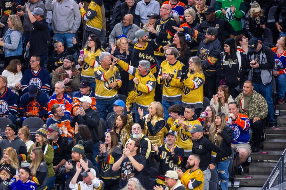 Golden Knights fans celebrate a goal against the Edmonton Oilers during the first period of the ...