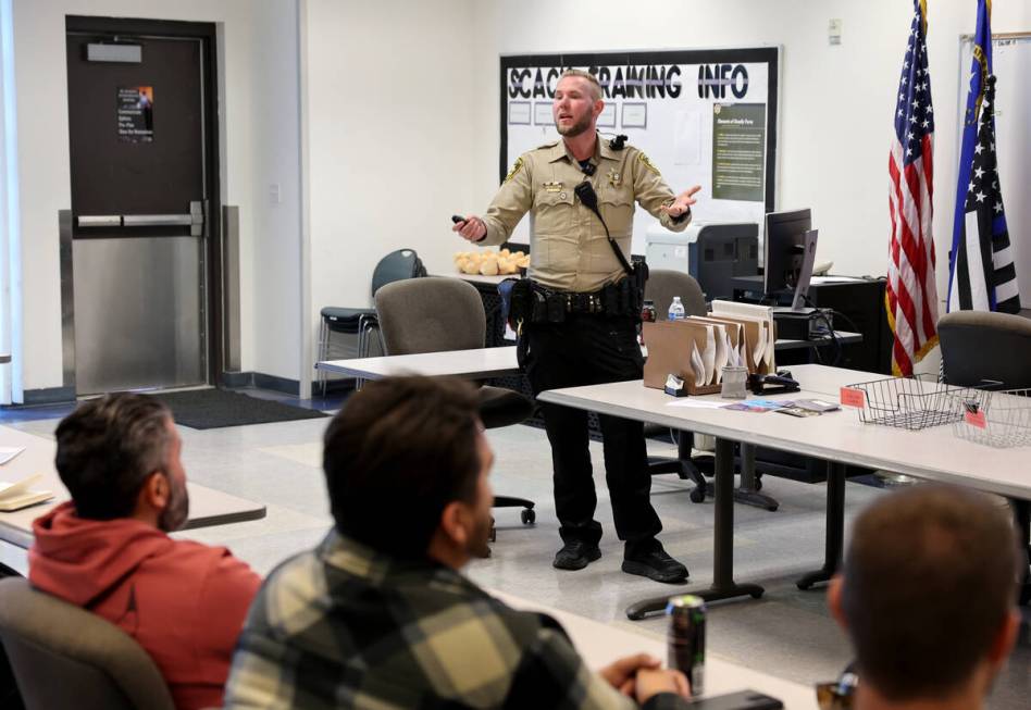 Las Vegas police officer and member of the department’s Hope and Outreach Team Baron Bybee ta ...