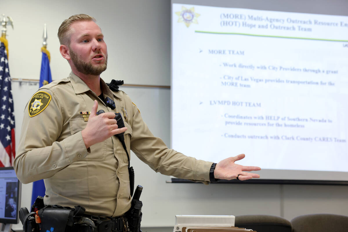 Las Vegas police officer and member of the department’s Hope and Outreach Team Baron Bybee ta ...