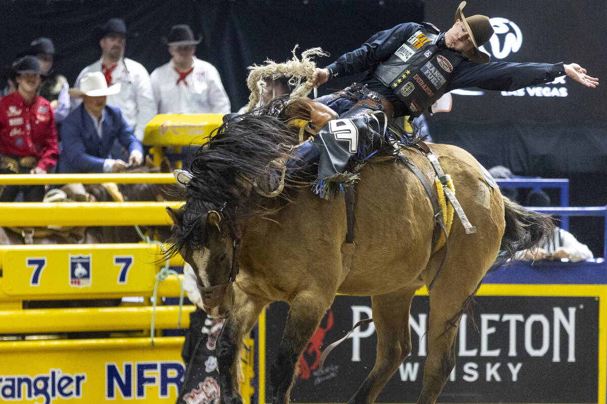 Zeke Thurston competes in the saddle bronc riding event during opening night of the National Fi ...