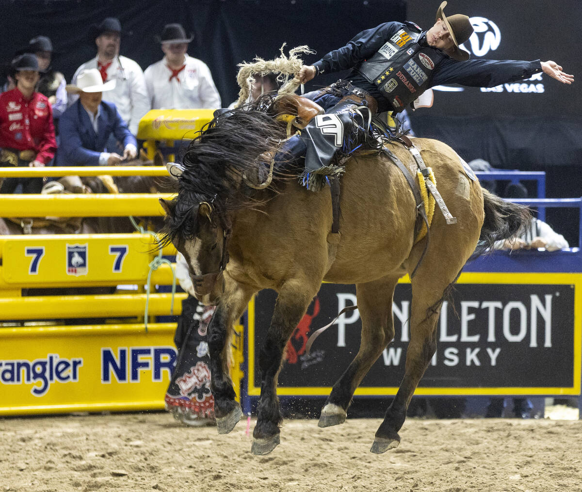 Zeke Thurston competes in the saddle bronc riding event during opening night of the National Fi ...