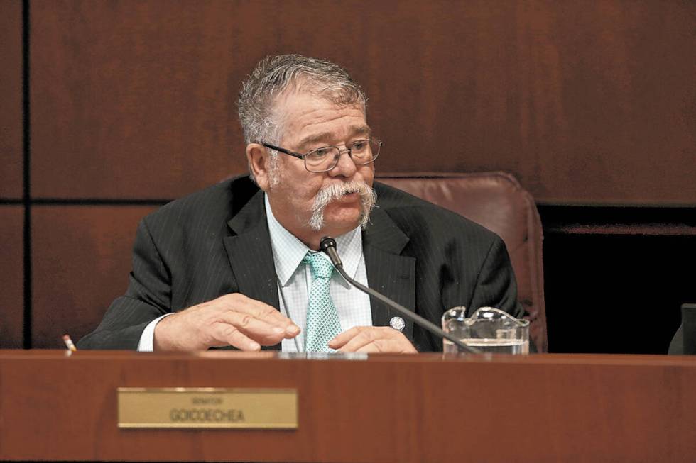 Sen. Pete Goicoechea, R-Eureka, asks a question during a Finance Committee meeting in the Legis ...