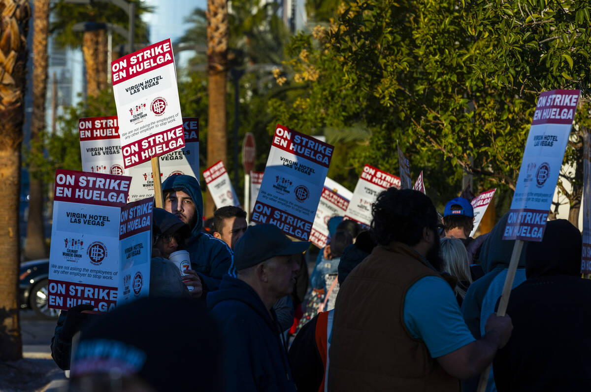 Culinary Local 226 workers on strike outside the Virgin Hotels after they and management failed ...