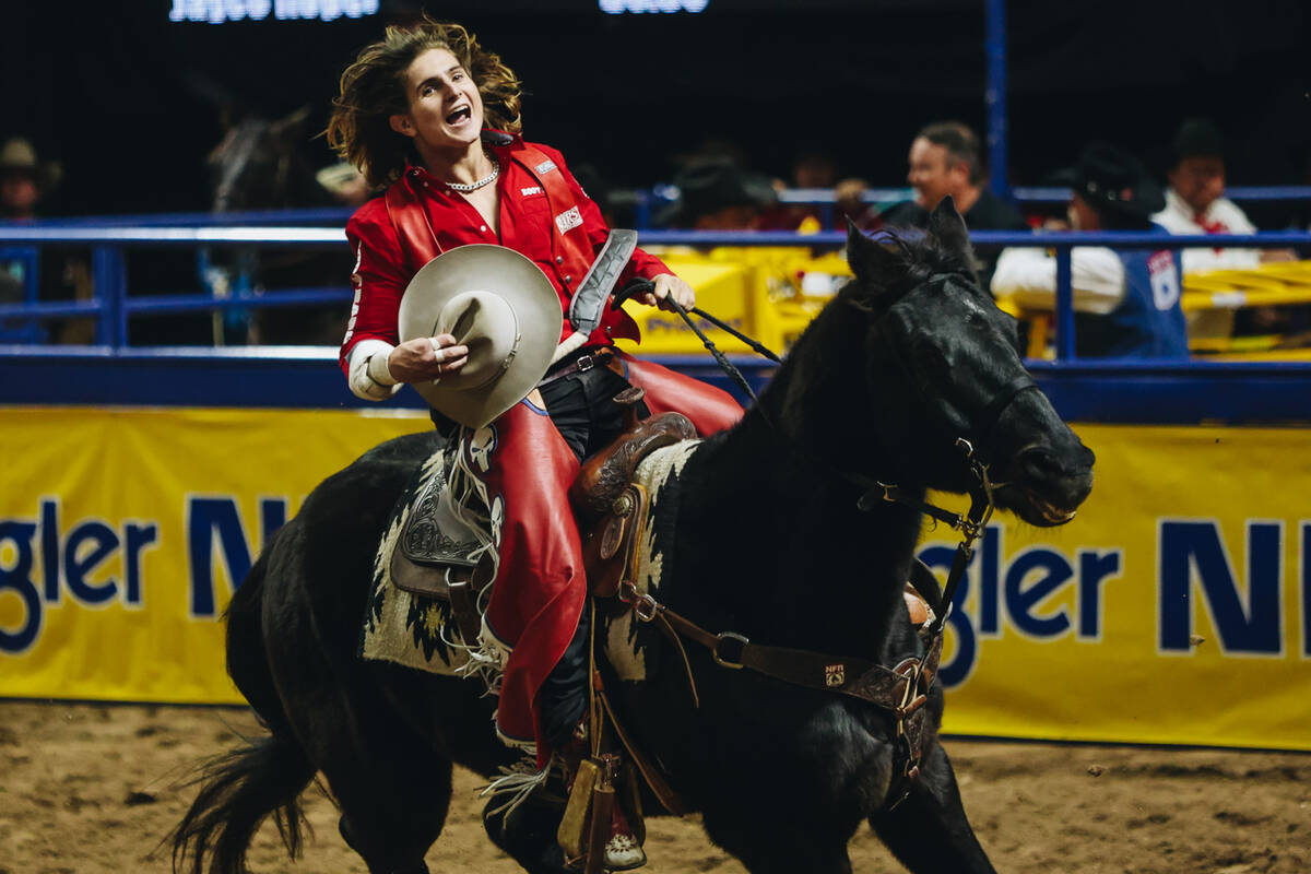 Rocker Steiner does a celebratory lap after winning round one of bareback riding with an 87 poi ...