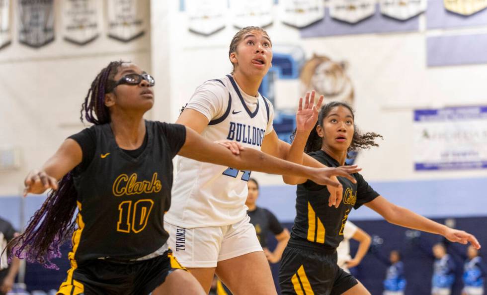 Clark’s Marriana Jellks (10), Centennial sophomore Nation Williams, center, and Clark&#x ...