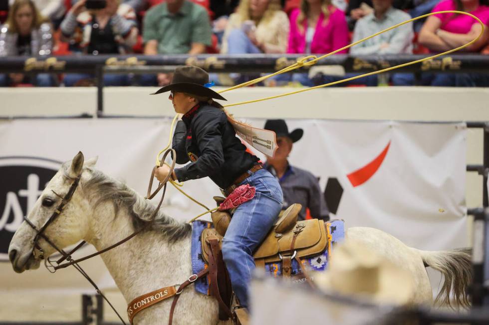 Breakaway roper Kendal Pierson chases a calf from the chute during the final day of the Nationa ...