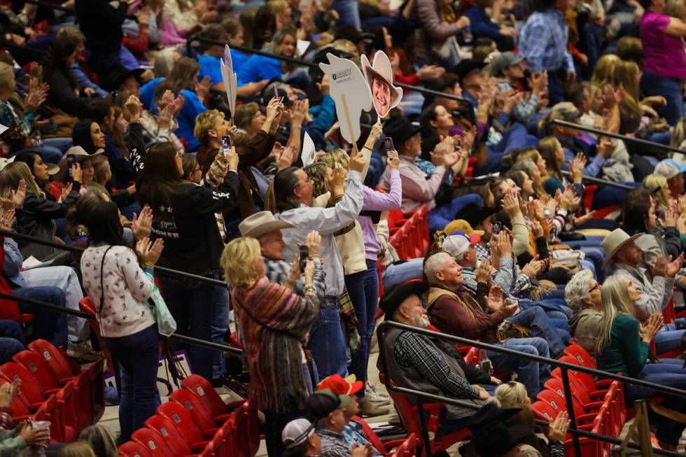 Rodeo fans cheer during the final day of the National Finals Breakaway Roping event at South Po ...