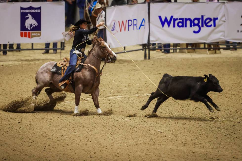 Breakaway roper Jackie Crawford misses the calf during the final day of the National Finals Bre ...