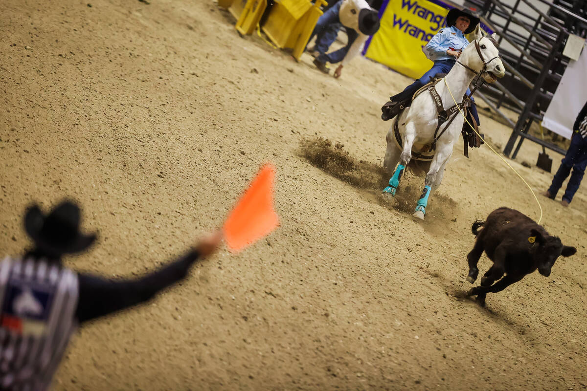 Breakaway roper Rickie Fanning ropes a calf during the final day of the National Finals Breakaw ...