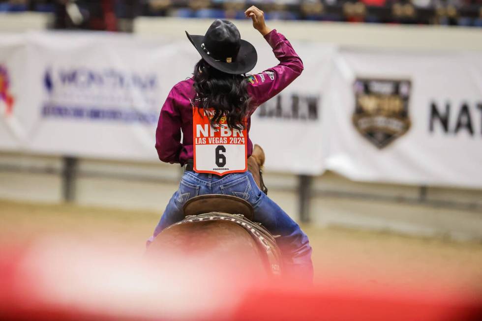 Breakaway roper Martha Angelone reacts to her roping time during the final day of the National ...