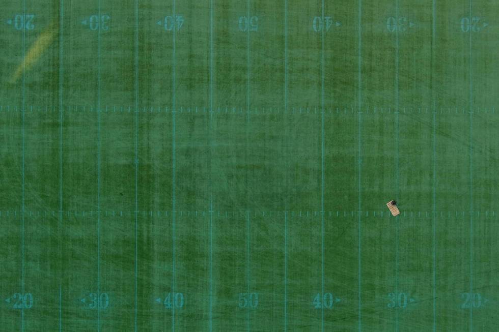 An aerial view of the playing field with an abandoned table and chair at Sam Boyd Stadium Wedne ...