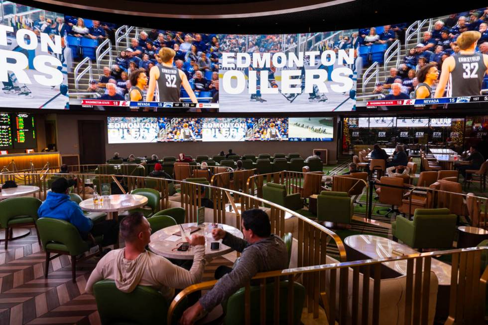 People take in the action at the sportsbook at the Durango on Monday, Dec. 2, 2024, in Las Vega ...