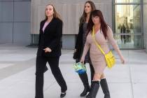 Kirstin “Blaise” Lobato, left, walks out of the Lloyd George U.S. Courthouse afte ...