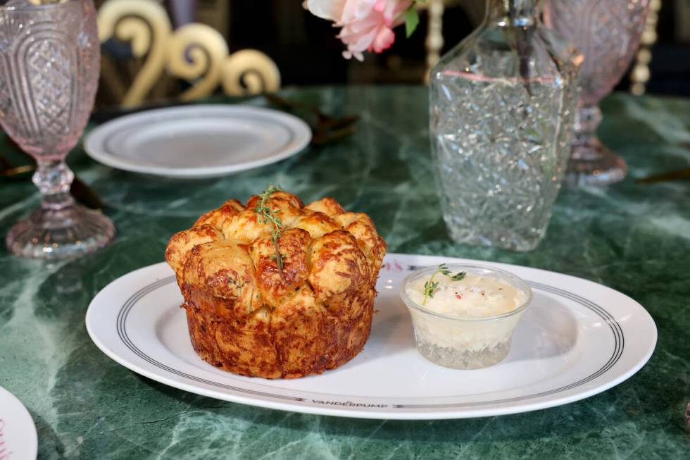 Pull apart herb bread loaf with whipped honey butter is shown at Pinky’s by Vanderpump, the l ...