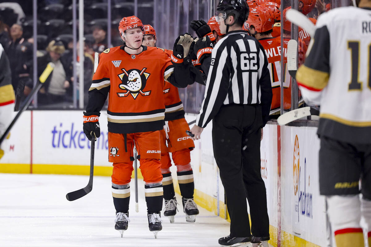 Anaheim Ducks defenseman Jackson LaCombe celebrates with the bench after scoring against the Ve ...